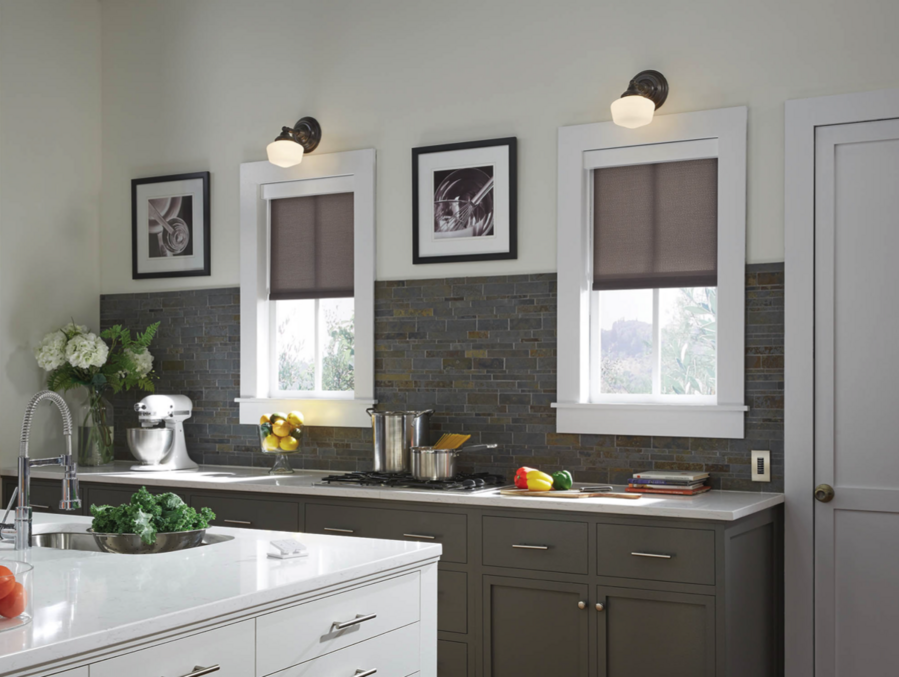 Lutron kitchen with motorized shades, lighting fixtures.